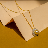 GOLD PEARL AND DIAMOND PENDANT